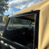 A photo of Vintage Ex-Military Land Rover Hood Commission by Kingsmead Marquees